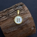 Natural white shell pendant with golden letter H in round frame for DIY jewelry - Letter H / 17x20mm