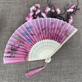 Pink Chinese folding fan with peach blossom pattern, bamboo ribs and pink tassel detail - No.25 Pink Peach Blossom