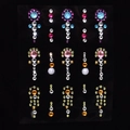Detail showing various colors and shapes of face gemstone stickers on transparent cards - MX-27 Colorful