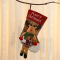 Close-up of a festive Christmas stocking with a 3D plush reindeer on a branch - Reindeer Design