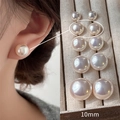 Elegantes pendientes de perlas blanco crema de 10mm en modelo y en conjunto - US 10 / Rosa