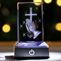 Detailed 3D laser engraving of a cross and praying hands inside a crystal cube light - Praying Hands / 5x5x8CM