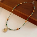 Starfish necklace with colorful beads and a sun-moon engraved silver-tone pendant - Star Sun Moon Pendant Multicolored Beaded Necklace