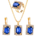 Elegant gold-plated jewelry set with large rectangular blue gemstones and rhinestones - KC Gold Royal Blue Style (7494)