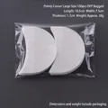 Pack of 100 white large crescent non-woven eyeshadow shields in OPP self-sealing bag - 100Pcs/Large/OPP Bag