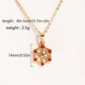 Weihnachtliche Goldkette mit rotem Emaille-Schneeflocken-Anhänger für Damen Geschenke - Goldene Hohle Schneeflocke
