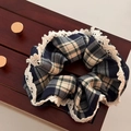 Plaid scrunchie in deep blue with white lace trim on vintage wooden background - Navy Blue Plaid - Lace Edge