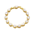 Detailed macro view of 14 pear-cut AAA cubic zirconia stones on a gold bridal bracelet - Silver Color