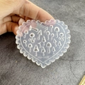Transparent heart-shaped silicone mold with mushroom designs for DIY nail art and crafts - #018 Mushroom Pattern Mo-nail Heart Mold