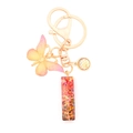 Pink and yellow resin butterfly keychain with letter I and colorful glitter sequins - Letter I