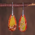 Close-up of teardrop emperor stone earrings with colorful textures on a branch - Red Yellow Green Mottled Style (ER1025-22)