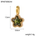 Macro view of a gold star pendant with green stone and measurements of 1.5cm by 0.8cm - BP48760B2A4-Light Green Star Pendant