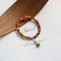 Colorful ceramic bead bracelet with flower pendant on dark wood leaf decor - 939A Nanyin