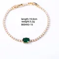 Gold tennis bracelet featuring white cubic zirconia and a green oval center stone, 19cm long - 16K Gold Oval Green Zircon