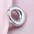 Polished silver stainless steel oval pendant for DIY jewelry making on pink fabric - Silver