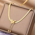 Detail of gold double-layer butterfly necklace with bead tassels on flat snake chain - Gold (BXG016-1)