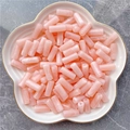 Pink cloud-patterned acrylic cylinder tube beads for DIY jewelry making in a white dish - 8x20mm / Lotus Pink