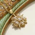 Elegante gouden ster hanger ketting met ronde parels en fonkelende zirkonia steentjes - Zeshoekige Ster Parel Hanger