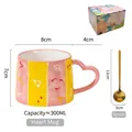 Pink and yellow hand-painted heart ceramic mug set with gold spoon and floral gift box - Mystery Symbol (With Spoon)
