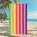 Microfiber beach towel with vibrant vertical rainbow stripes on a tropical beach - 80*160cm / Rainbow Vertical Stripes