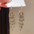 Detailed macro of vintage s925 silver earrings with blue crystal drops and long tassels - Style 38# Ear Hook-Gold-Multicolor