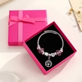 Silbernes Kronen-Charm-Armband mit Lebensbaum und rosa Kristallen in rosa Geschenkbox - Mit Schmuckschatulle / Baum des Lebens