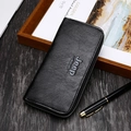 Men's long zip-around wallet in black lychee grain leather with embossed brand logo - Black