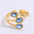 Titanium steel open ring in gold finish with three inlaid blue oval gemstones - Three Blue Stones Style (JZ23-1)