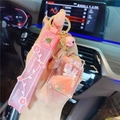 Pink unicorn liquid quicksand keychain with silicone wrist strap and small bell charm - Pink-Milk Box Unicorn