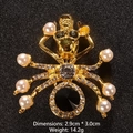 Exquisite gold spider brooch with black gemstone and white pearls for elegant suits - Exquisite Spider Style (XD8167)