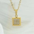 Macro shot of gold square pendant with sixteen round clear cubic zirconia stones - Square Pendant