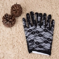Elegant black floral lace long gloves for weddings and ceremonies on soft beige background - One Size / 22cm Black