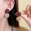 Detail of plush brown ball earrings and velvet flower studs shown on a model - 108# Flocked Flower Pom Pom / Brown/Coffee
