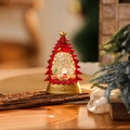 Rode zittende kerstman (watergevuld)
