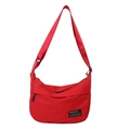 Chic bright red nylon crossbody bag with adjustable wide strap and zipper closure - Red