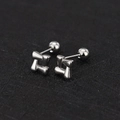 Detail of silver geometric square knot stud earrings with secure screw back closure - Square / Steel