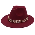 Detailed close-up of a burgundy fedora hat featuring a chunky gold acrylic chain band - Burgundy