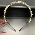 Detail of handmade crystal crown headband with beige stone chips on a black frame - Dalmatian Jasper + Silver Band