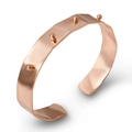 Minimalist rose gold open cuff bracelet featuring wave pattern and stud accents - Rose Gold