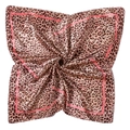 Detailed view of large leopard print satin scarf with pink borders in a folded display - Pink