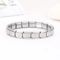 Italian charm bracelet in stainless steel featuring pink paw print modular links - 1428 - Pink Cat Paws (section 1)