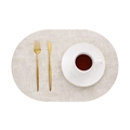 Oval beige leather placemat with linen texture finish on a clean white background - Oval / Oval Oatmeal