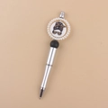 Macro shot of silver ballpoint pen featuring a messy bun silhouette with pearl accents - Leopard Girl/Silver Barrel