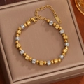 Bracciale a sfere bicolore in acciaio inossidabile placcato oro 18K con perline a trama - Bicolore (Oro e Argento)