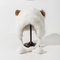 Detail of white faux fur winter hat with cute brown bear ears and soft plush pom-poms - M (56-58cm) / White