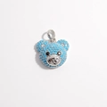 Detailed close-up of a silver bear head pendant featuring blue turquoise-style stones - Silver With Lake Blue Zircon
