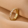 Bow-knot style gold-plated ring featuring baguette-cut stones and intricate hollow patterns - Gold Baguette Zirconia Eternity Ring (1237)