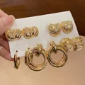 Set di 5 paia di orecchini dorati con cuori e borchie a sfera con trama intrecciata - Perno in Argento - Oro (Set da 5 Paia)