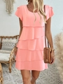 Detail of pink layered tiered dress with ruffle sleeves and round neck in boho setting - S / Bottoms / Pink