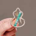 Elegant gold-plated gourd brooch with green bamboo inlay and sparkling rhinestones - 389# Gourd